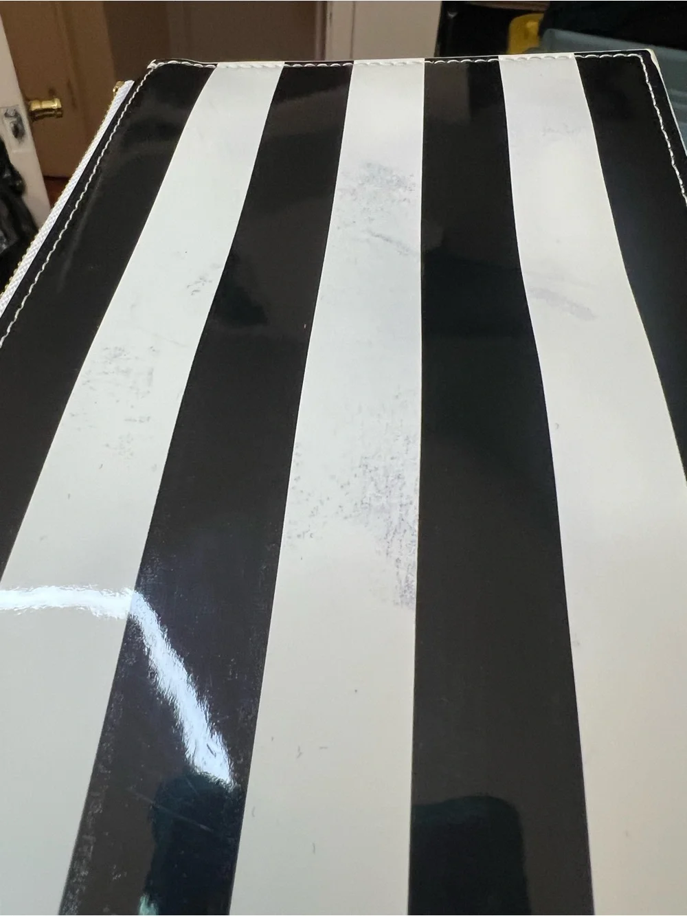 kate spade Black and White Striped Patent pouch